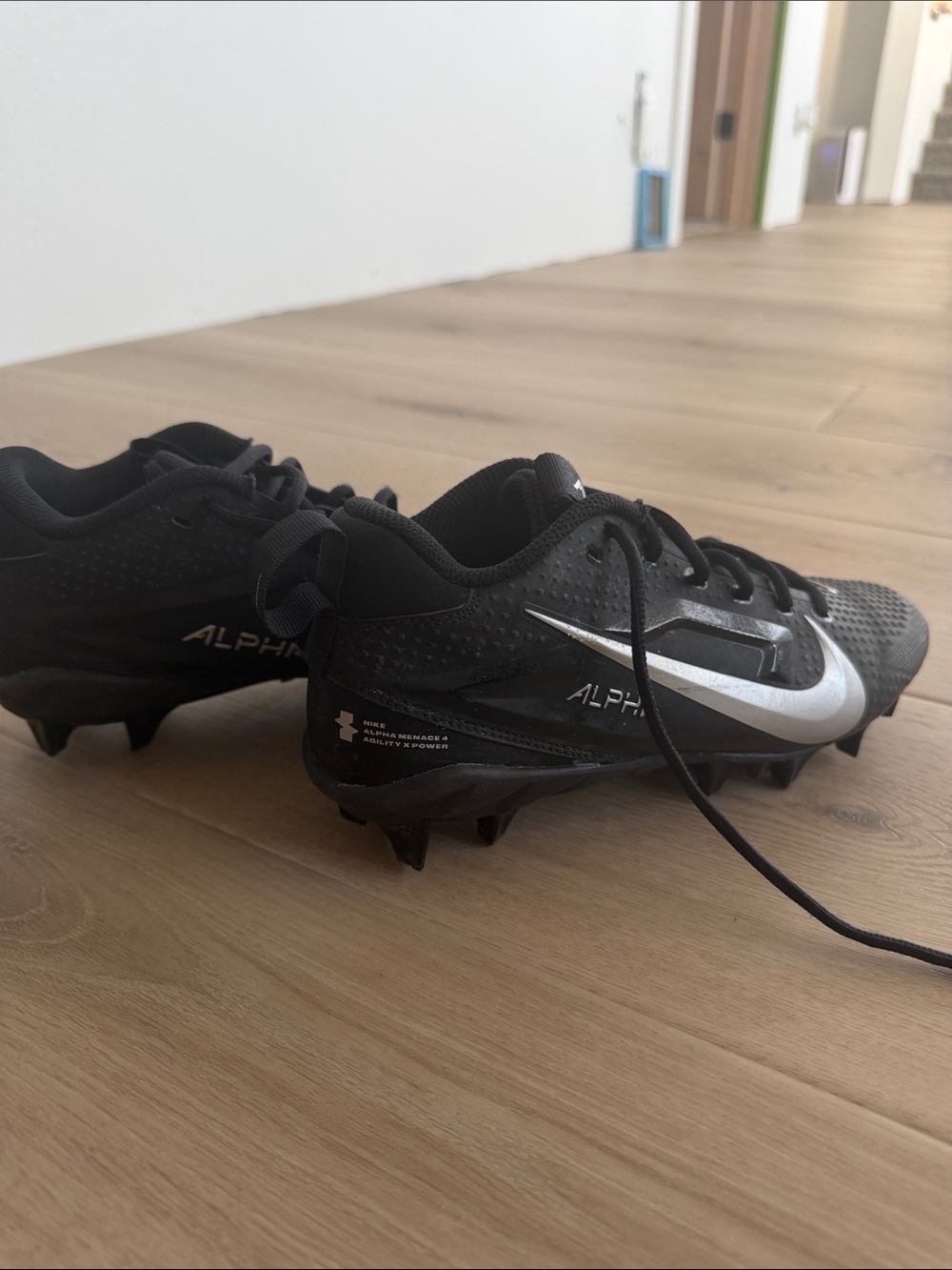 Nike Alpha Kids Black Soccer Cleats with Silver Swoosh